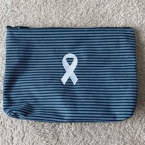 Thirty-one blue striped Large Zipper pouch with cancer ribbon- EUC
